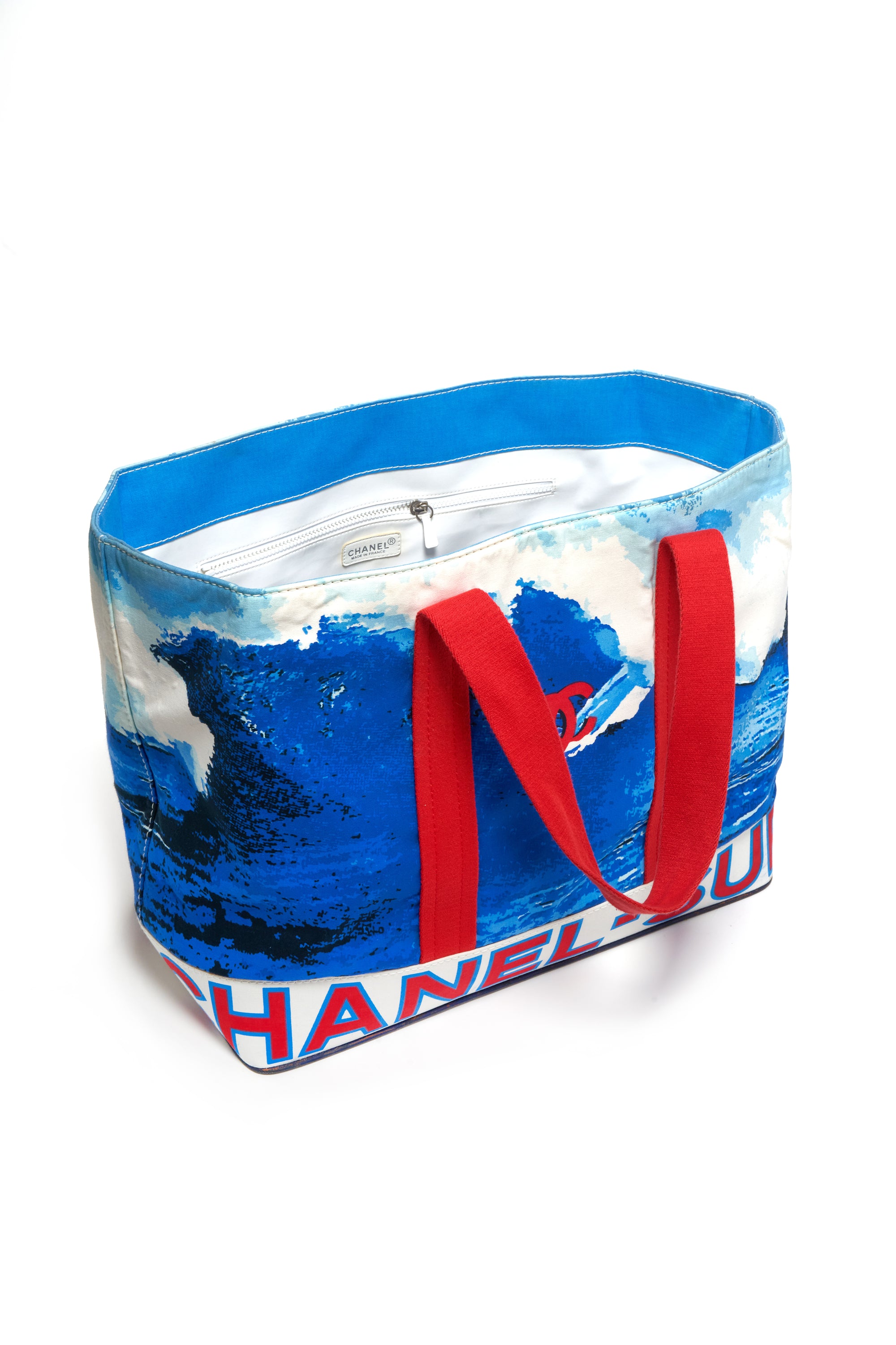 その他 CHANEL SUPER COLLECTION 2002 Chanel Red and Blue Surfing CC Wave Tote 2002 XL - Foxy Couture Carmel