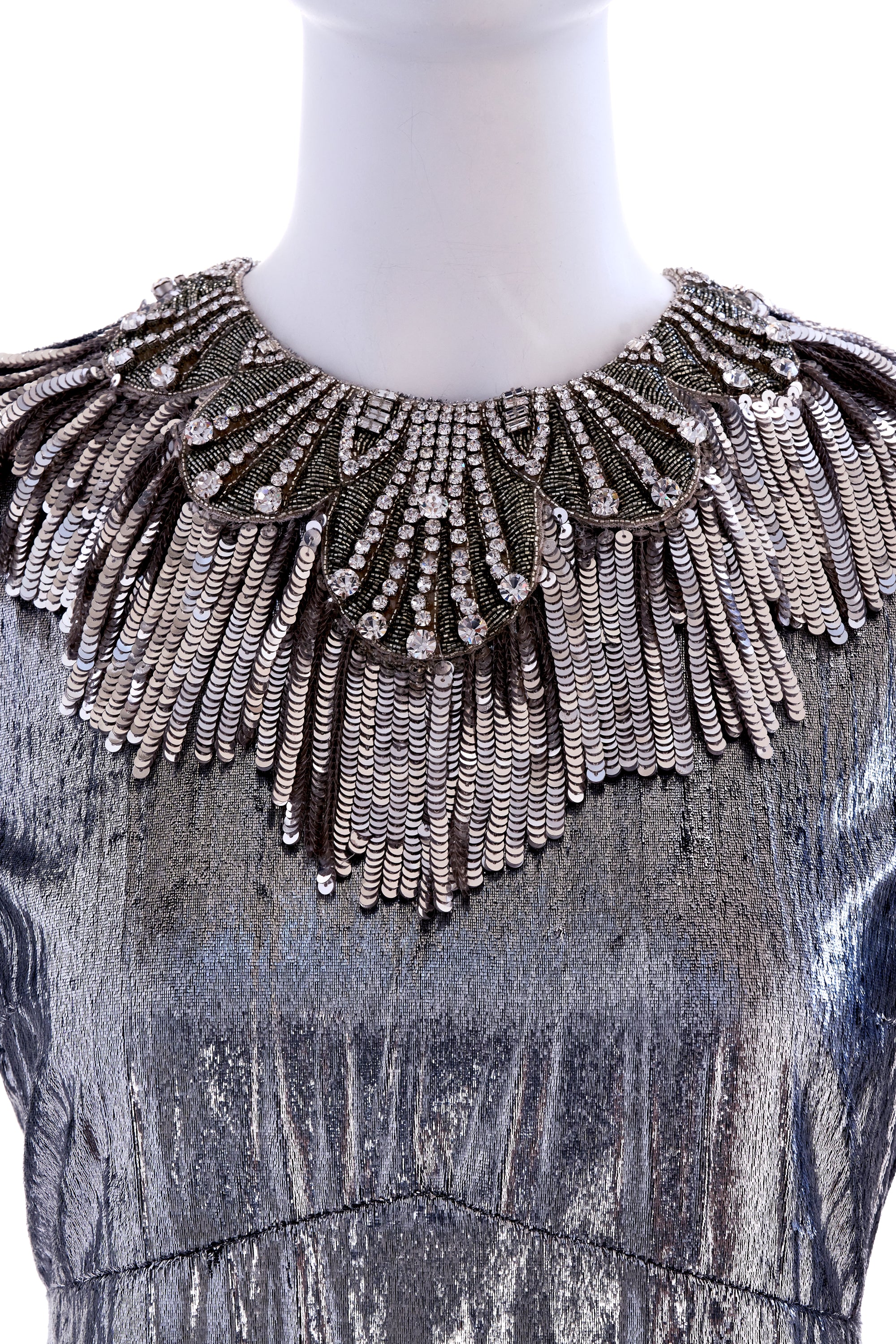 silver gucci dress DAKOTA JOHNSONS SHEER GUCCI MOMENT AT CANNES IS ONE FOR THE BOOKS, Dakota Johnson was a vision of modern glamour at the 2025 Kering Women In Motion Awards, wearing a silver sheer Gucci gown that